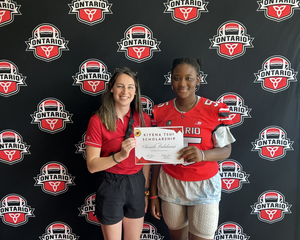 Football Ontario recognition certificate being presented
