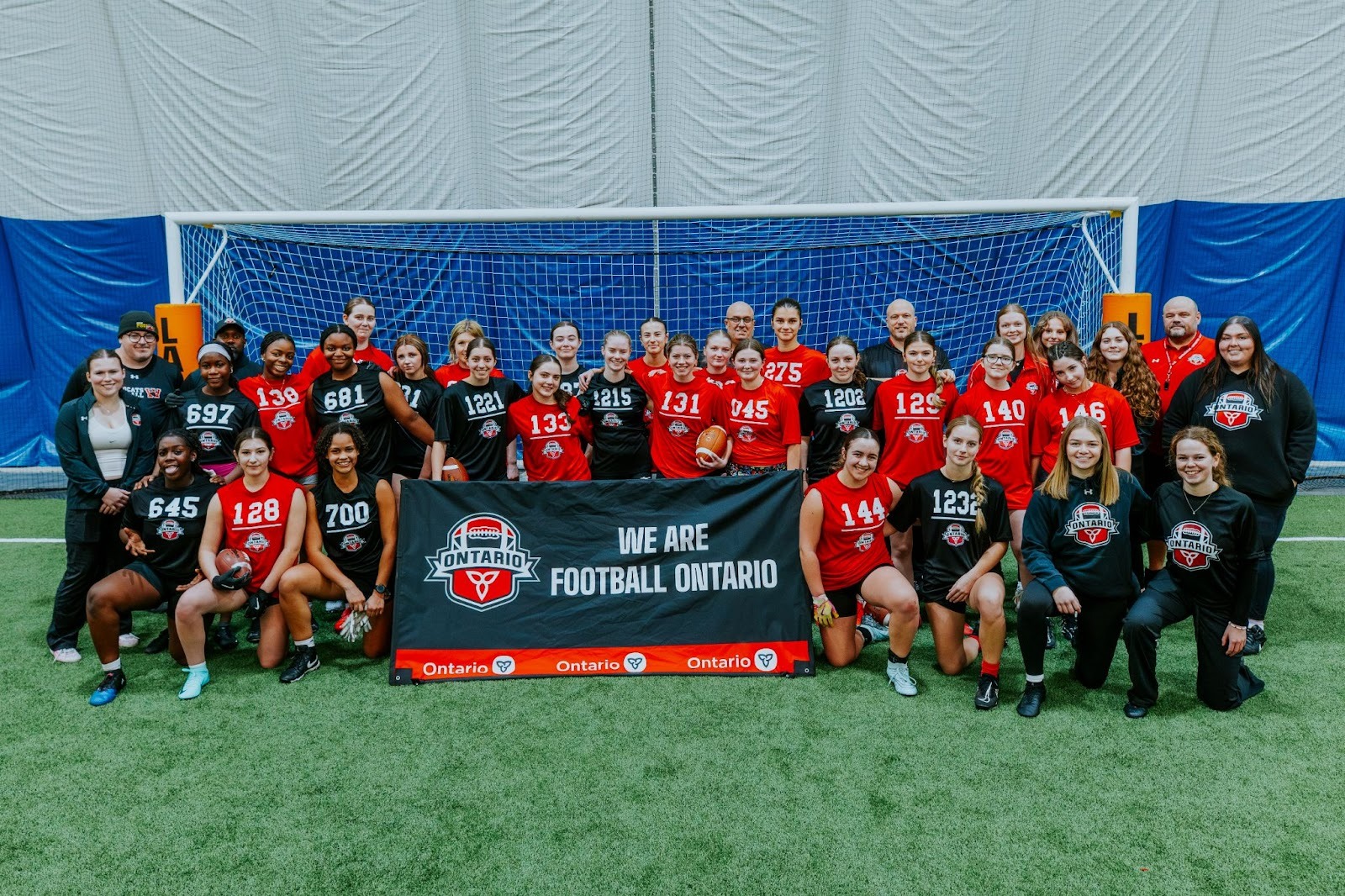 Team Ontario women’s tackle players celebrating