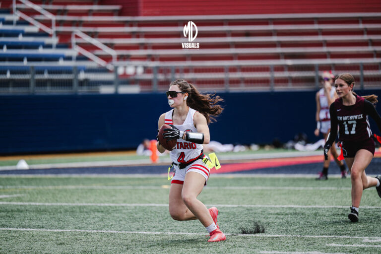 Ontario flag football athlete running with the ball